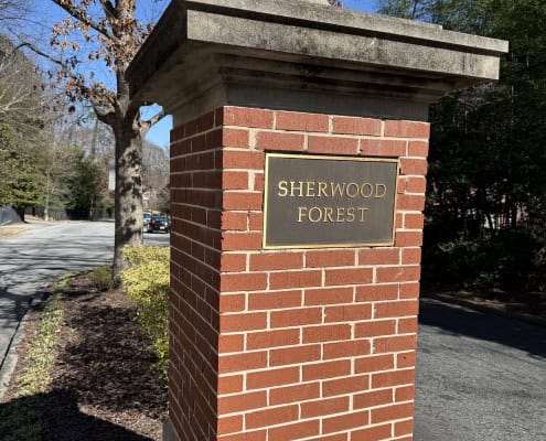 Official brick and stone entrance monument for the Sherwood Forest neighborhood in Midtown Atlanta.